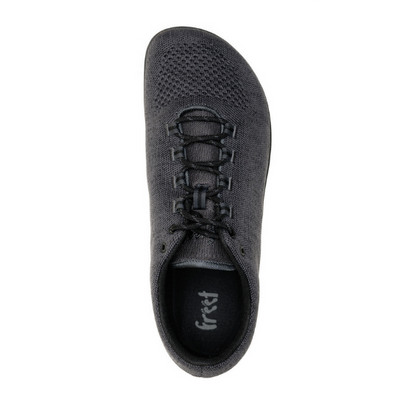 A photo of Freet Pace sneakers in charcoal. Sneakers are completely knit and have a detatched tongue. Laces are black and loop through fabric tabs attached to the shoe and a tab on the tongue. The right shoe is shown here from the top down against a white background. #color_charcoal