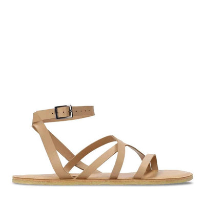 A photo of beige leather Groundies Florence Sandals. Two leather straps start at the ball of the big toe with one ending at the ball of the little toe and the other midfoot. Another strap goes from one side of the heel over the top of the foot to the other side with one final strap wrapping around the ankle and closing with a buckle. Shoe is shown from the right side against a white background. #color_beige