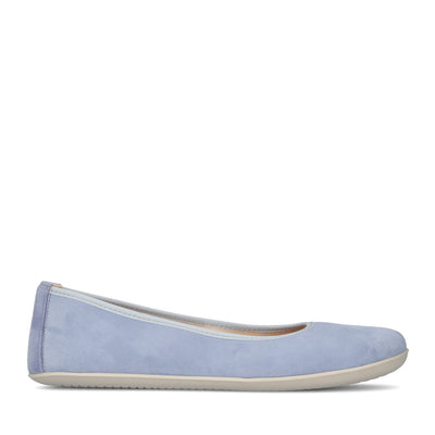 A photo of Groundies Lily Soft flats with a leather upper and cream rubber true sense soles. The flats are a nubuck in a light blue color, the trim around the tops of the flats is a baby blue color and is lighter than the rest of the flats. The interior of the flats is a light beige color. The left flat is shown from the right side against a white background. #color_light-blue