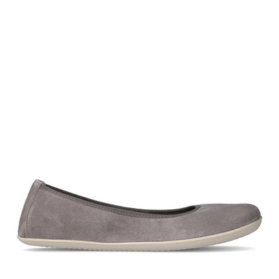 Photo 1 - A photo of Groundies Lily Soft Barefoot+ flats with a leather upper and white rubber true sense soles. The flats are a soft leather in a Grey color with trim around the tops. The interior of the flats is a light grey color. The left flat is shown from the right side against a white background., Photo 2 - Right shoe is shown from the top down against a white background. #color_grey