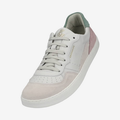 A photo of Groundies Nova sneakers made from leather and rubber soles. The sneakers are beige and white with pink/green accents on the heel, they also have perforation on the toe box. The left sneaker is shown floating downward against a white background. #color_beige-green-pink