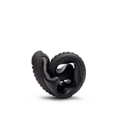 A photo of Groundies Palermo dress shoes made of leather upper and rubber soles. The shoes are a black color with black soles and dress sole detailing by the laces. One shoe is shown rolled into a ball to show flexibility against a white background. #color_black