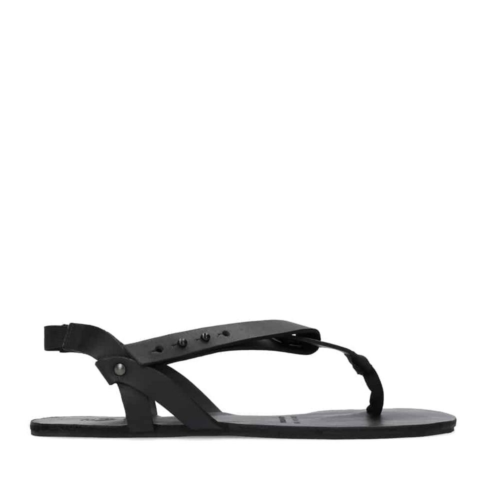 Photo 1 - Groundies Riva Sandals in black. Sandals feature 5 smooth and sleek black leather straps One spanning from one side of the heel to the other, two attaching that heel strap to mid shoe on either side, and two attaching the back straps to the front of the shoe making a Y shape starting in between the big toe. Shoe is shown from the right side a white background., Photo 2 - Groundies Riva Sandals in Black. Right shoe is shown from the top down against a white background. #color_black