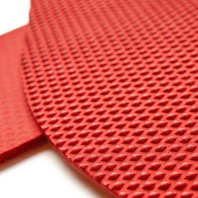A photo of Naboso activation insoles not performance insoles made for sensory activation. The insoles are a red color with bumps on top. Both insoles are shown up close up to show detail of the bumps and the underside of the insoles. #insole-type_performance