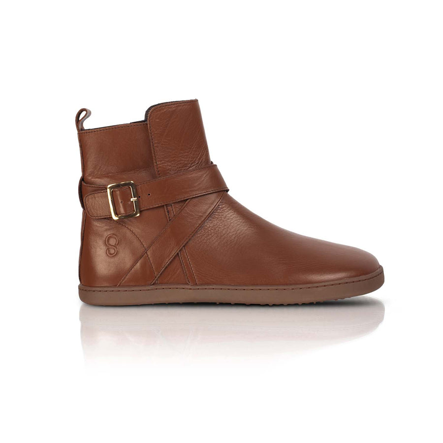 All brown leather Shapen Divine ankle boots with a pull tab, a wrap-style ankle strap, gold buckle, and a side zipper. Right boot is shown facing right against a white background. #color_brown